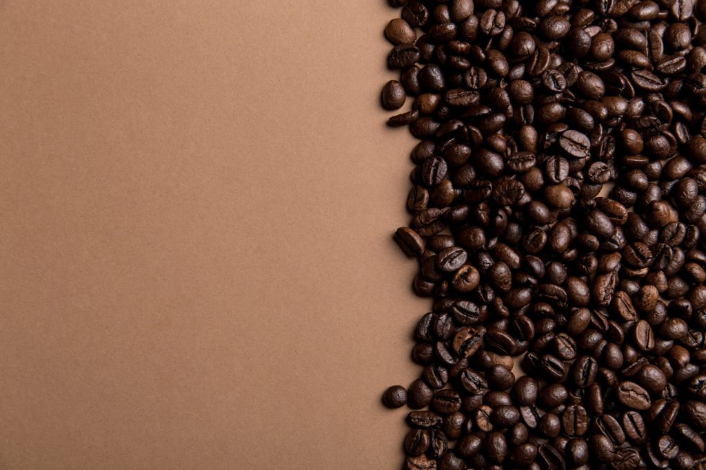 Table with coffee beans on one side