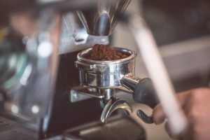 Coffee beans in grinder