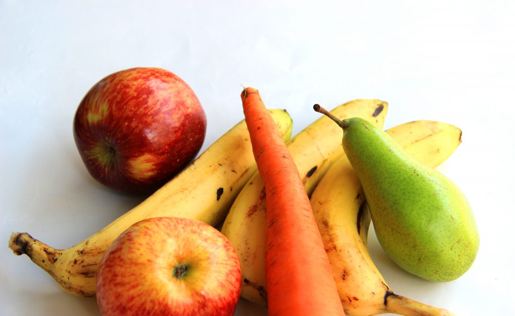 Image of carrots, bananas, apples, and pears