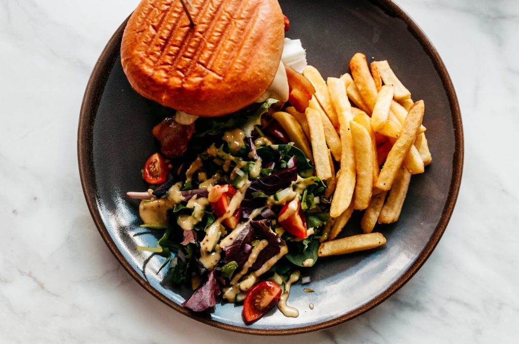 Plate with hamburger and sides