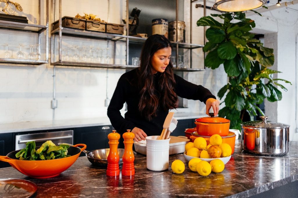 Woman cooking in kitchen